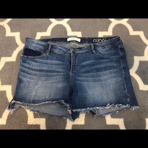 Slink jean shorts; frayed edges